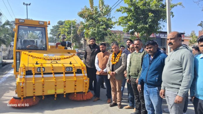 MLA Dr Bharat Bhushan dedicating Modern Road Sweeping Vehicle to public in Kathua on Wednesday.