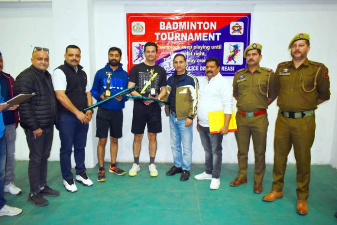 Dignitaries alongwith Badminton players posing with their trophies. Dignitaries alongwith Badminton players posing with their trophies.