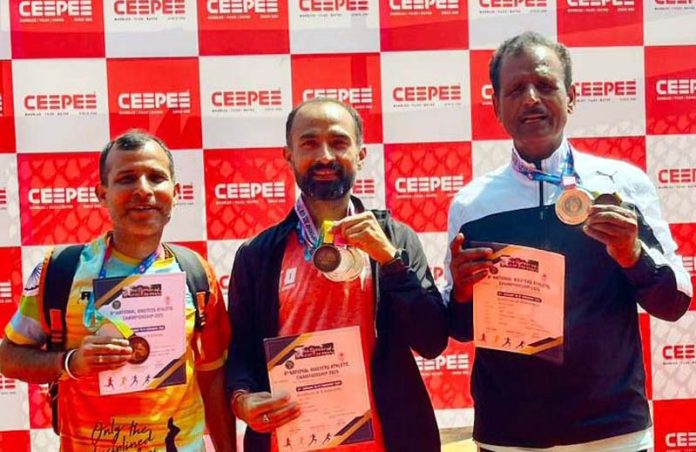 SMVDSB employees displaying medals after an outstanding performance at 6th National Masters Athletic Championship in Kerala.