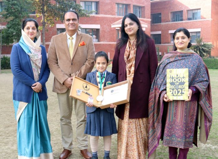 Vaanya Mahajan posing along with teaching staff. Vaanya Mahajan posing along with teaching staff.
