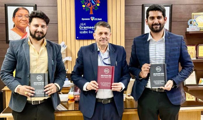 Sanjay Gupta, Chairman, J&K Grameen Bank launching diary of Jammu-Jhelum Infra services in Jammu on Friday.