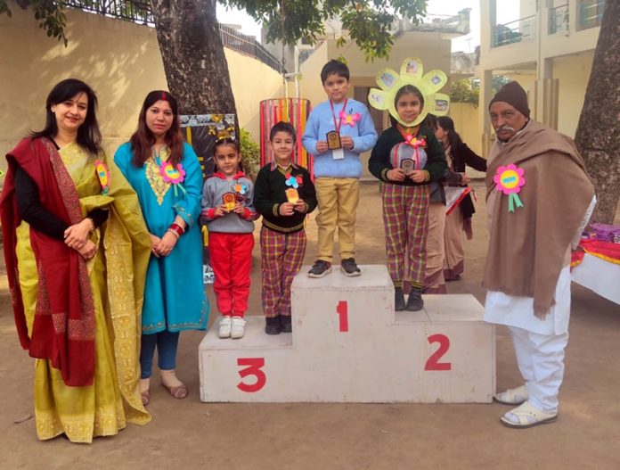 DBN Amarvilla students posing with school management during interschool competition.