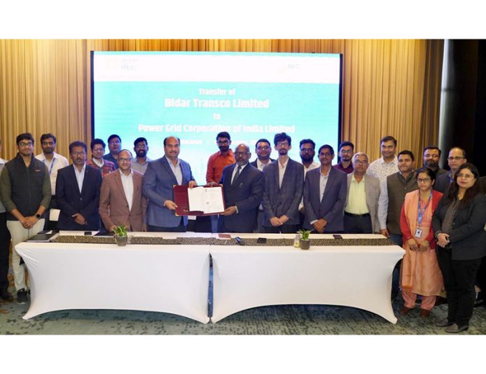 The officials of RECPDCL and PGCIL exchanging the SPVs under ISTS Transmission Projects on Wednesday.