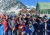 Sports Minister posing along with young skners and officials at Sonamarg.