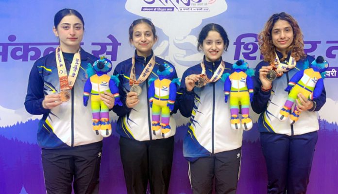 J&K Fencing team posing with their medals at National Games.