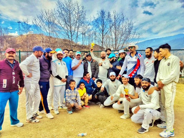 Team posing along with trophy at Bhaderwah. Team posing along with trophy at Bhaderwah.