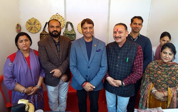 MLA Baldev Raj Sharma posing along with others during a function held at Katra on Saturday.