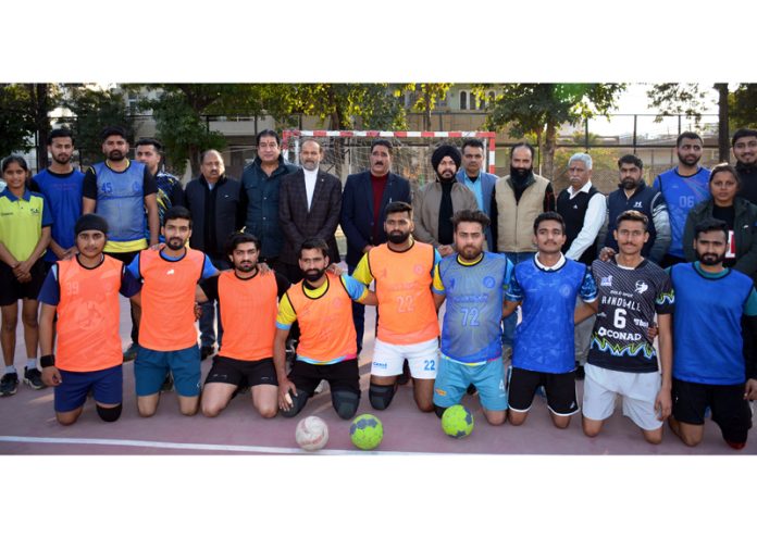 Handball players posing along with dignitaries at Jammu.