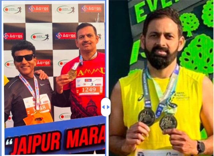 Athletes of J&K UT displaying medals during the AU International Jaipur Marathon.