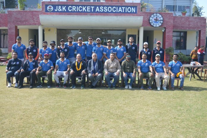 J&K Ranji team posing with Brigadier Anil Gupta, Member Administration JKCA on Thursday.