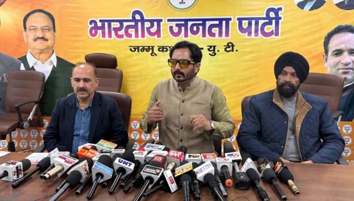 Dr Abhijeet Jasrotia addressing a press conference in Jammu on Friday.
