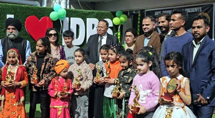 Dignitaries posing with children during Kids Talent Show 2025 at Jammu. Dignitaries posing with children during Kids Talent Show 2025 at Jammu.