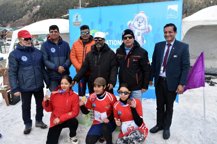 Athletes posing with dignitaries during prize distribution ceremony in Sonamarg. Athletes posing with dignitaries during prize distribution ceremony in Sonamarg.