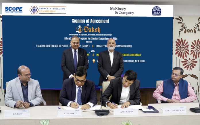 Officers of SCOPE and CBC signing an agreement with McKinsey & Company and IIM Ahmedabad for DAKSH program.