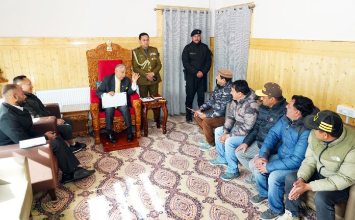 LG BD Mishra interacting with various delegations in Leh on Wednesday.