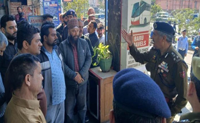 DIG Traffic Jammu, Dr Haseeb Mughal, interacting with travel operators in Jammu on Monday. DIG Traffic Jammu, Dr Haseeb Mughal, interacting with travel operators in Jammu on Monday.