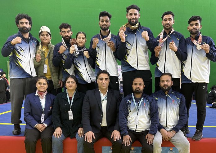 Bhanu, Kamraan win Gold; J&K Wushu clinches 2nd place at National Games Bhanu, Kamraan win Gold; J&K Wushu clinches 2nd place at National Games