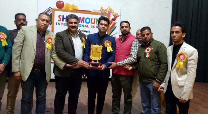 Guests and School staff at the annual day function on Saturday.