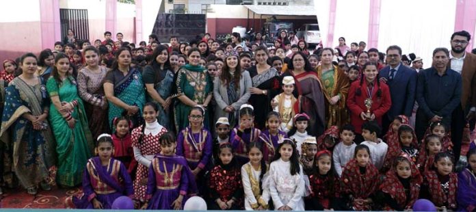 Students and others posing for a photograph at Jesus Care Convent School in Jammu on Saturday.