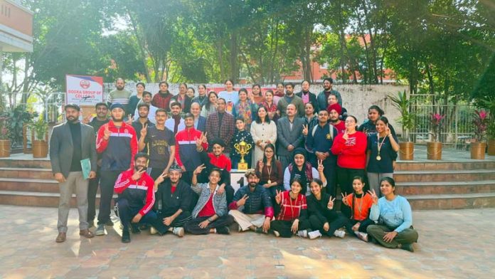 Students of Dogra group of Colleges alongwith others posing for a group photograph on Saturday.