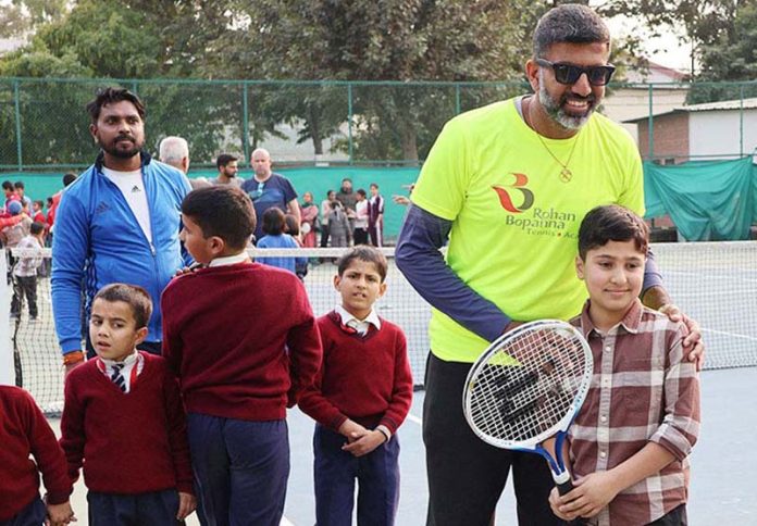 Indian Tennis player Rohan Bopanna with young players during 'Bhoomi' programme for under privileged an initiative of Rohan Bopanna Tennis Academy at MA Stadium in Jammu. Indian Tennis player Rohan Bopanna with young players during 'Bhoomi' programme for under privileged an initiative of Rohan Bopanna Tennis Academy at MA Stadium in Jammu.