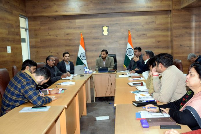 Director Information J&K, Nitish Rajora chairing a meeting.