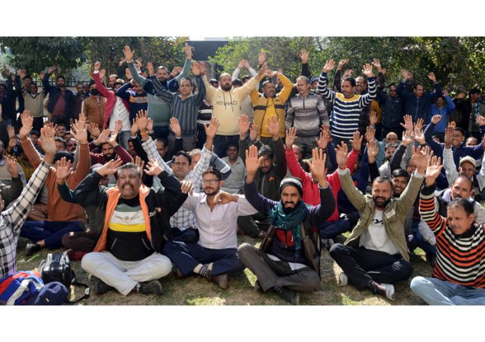 PDD daily wagers staging protest in Jammu on Monday. — Excelsior/Rakesh