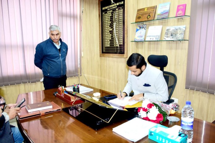 Nitish Rajora assuming charge as Director Information.