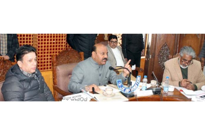 DyCM Surinder Kumar Choudhary chairing a meeting at Shopian on Friday.