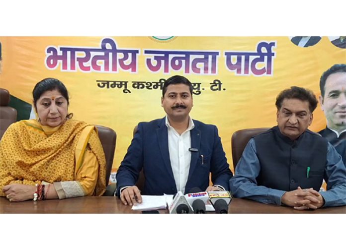 J&K BJP spokespersons Gaurav Gupta, Purnima Sharma and Balbir Ram Rattan during media briefing at Jammu.