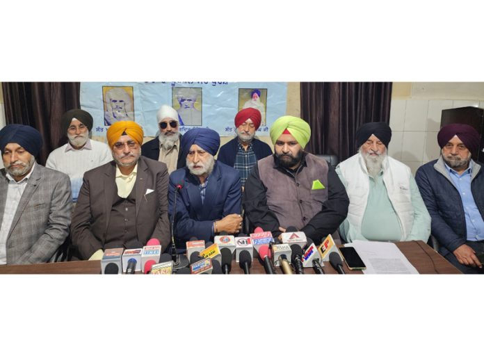 Manjit Singh, spokesperson Dera Sant Pura Danna Trust, along with others addressing press conference in Jammu. —Excelsior/Rakesh