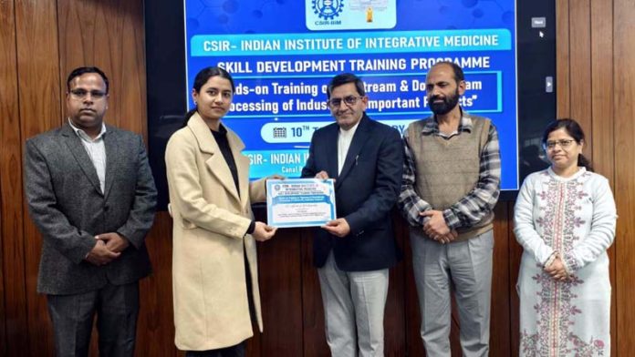 Dr Zabeer Ahmed, Director CSIR-IIIM handing over certificate to a participant at valediction of a training programme in Jammu on Friday.