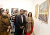 Dignitaries watching paintings at an exhibition in Jammu on Saturday. -Excelsior/Rakesh
