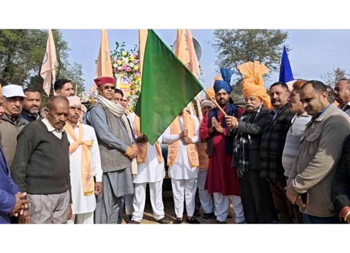 Senior NC leader Ajay Sadhotra flagging off Shobha Yatra of Guru Ravidas Ji at Karwanda in Jammu North.