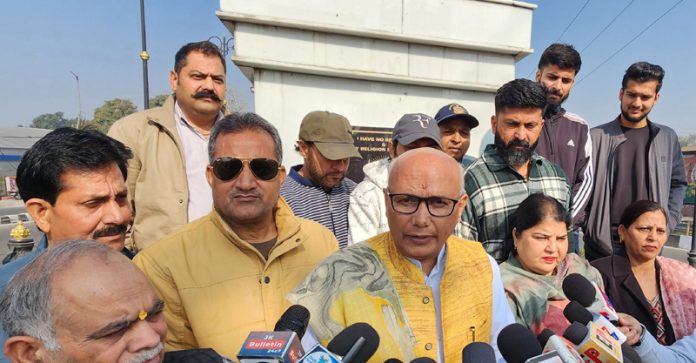 Former Mayor Rajinder Sharma talking to media persons during protest on Monday. - Excelsior/Rakesh Former Mayor Rajinder Sharma talking to media persons during protest on Monday. - Excelsior/Rakesh