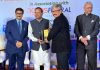 Dr Arun Manhas receiving award from Union Minister.