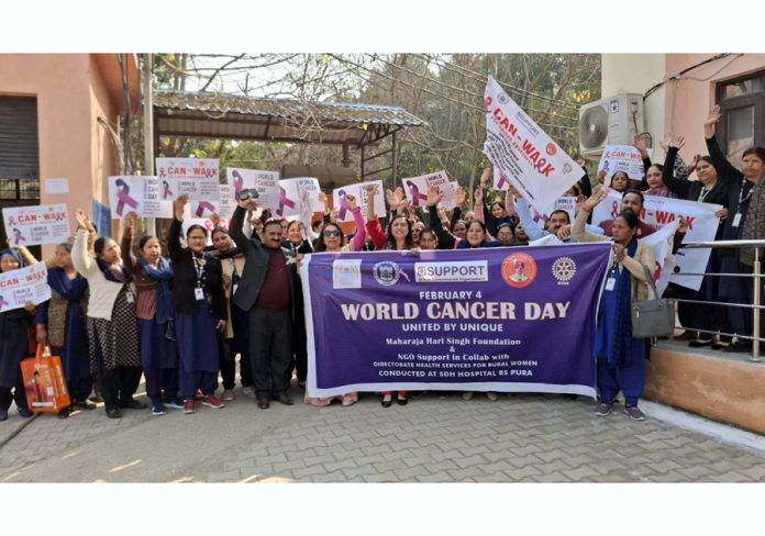 Doctors, volunteers from NGOs and ASHA workers during a cancer awareness programme at SDH RS Pura in Jammu district.