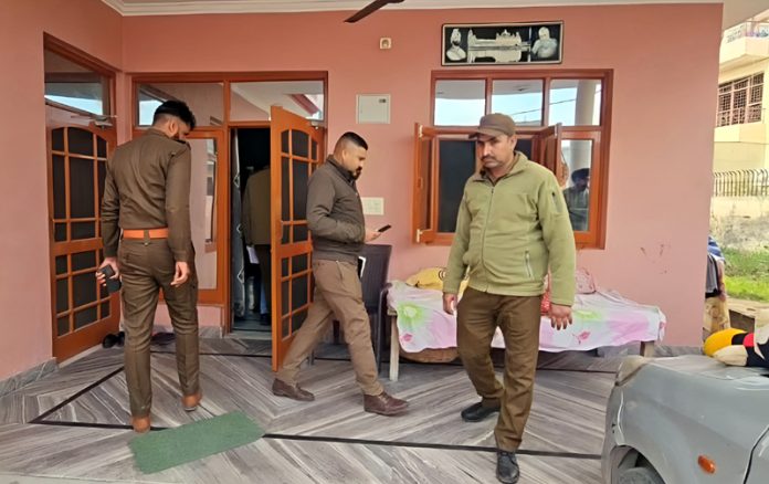 A police team investigating the crime spot at Nanak Nagar area. — Excelsior /Rakesh A police team investigating the crime spot at Nanak Nagar area. — Excelsior /Rakesh