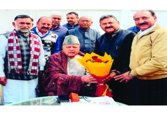A delegation of NC's State Central Labour Union during meeting with party president Dr Farooq Abdullah in Jammu.