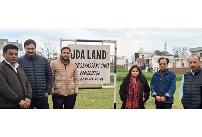 Officials of JDA posing during an anti-encroachment drive conducted on Thursday. Officials of JDA posing during an anti-encroachment drive conducted on Thursday.