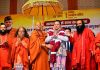 CM Pushkar Singh Dhami being felicitated by saints during a function in Prayagraj on Monday.