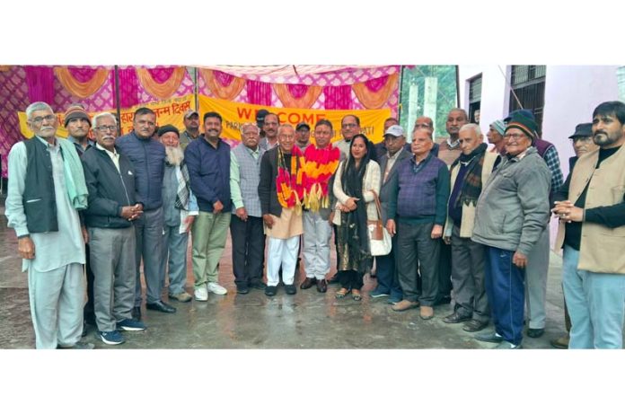 MLA Dr Bharat Bhushan posing along with others during a function organized at Kathua on Thursday.