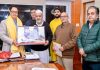AIKS delegation presenting a portrait to Union Minister Kiren Rijiju in New Delhi.