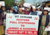 Activists and leaders of CPI (J&K) protesting at Jammu for restoration of Statehood.