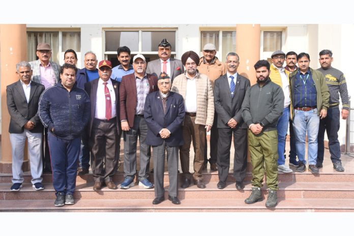 Ex-Servicemen participating in an orientation programme on HADP posing for a group photograph.