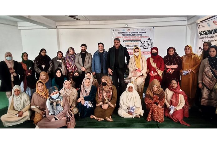 MLA Sajjad Shaheen posing alongwith AWs during a function in Banihal on Saturday.