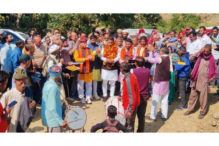 MLA Rajiv Jasrotia along with others after starting work on a road in Jasrota on Monday.