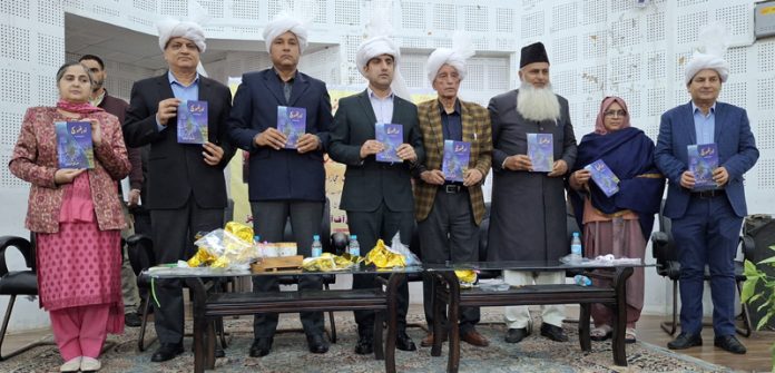 Mohammad Aijaz Asad, Secy RD and Panchayati Raj releasing a book in Jammu on Thursday.