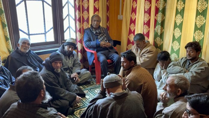 M Y Tarigami visits family of Ex-Army Jawan who was killed by militants at Behbagh Kulgam. -Excelsior/Sajad Dar