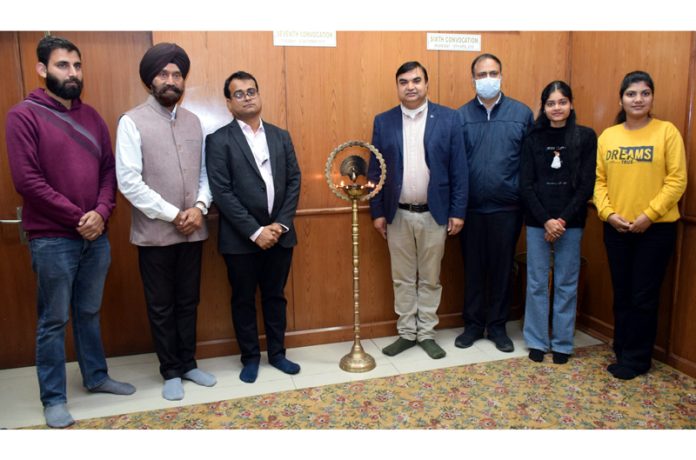 Organizers of workshop posing with speakers from industry.